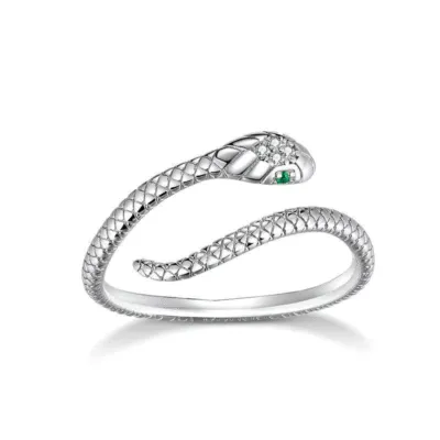 Bague argentée en forme de serpent enroulé, tête sertie de pierres et œil vert