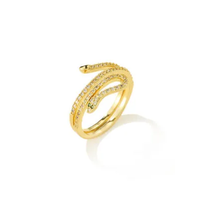 Bague dorée en forme de serpent enroulé, sertie de petites pierres claires