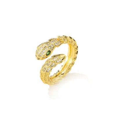 Bague dorée ouverte à deux têtes de serpent ornées de pierres claires
